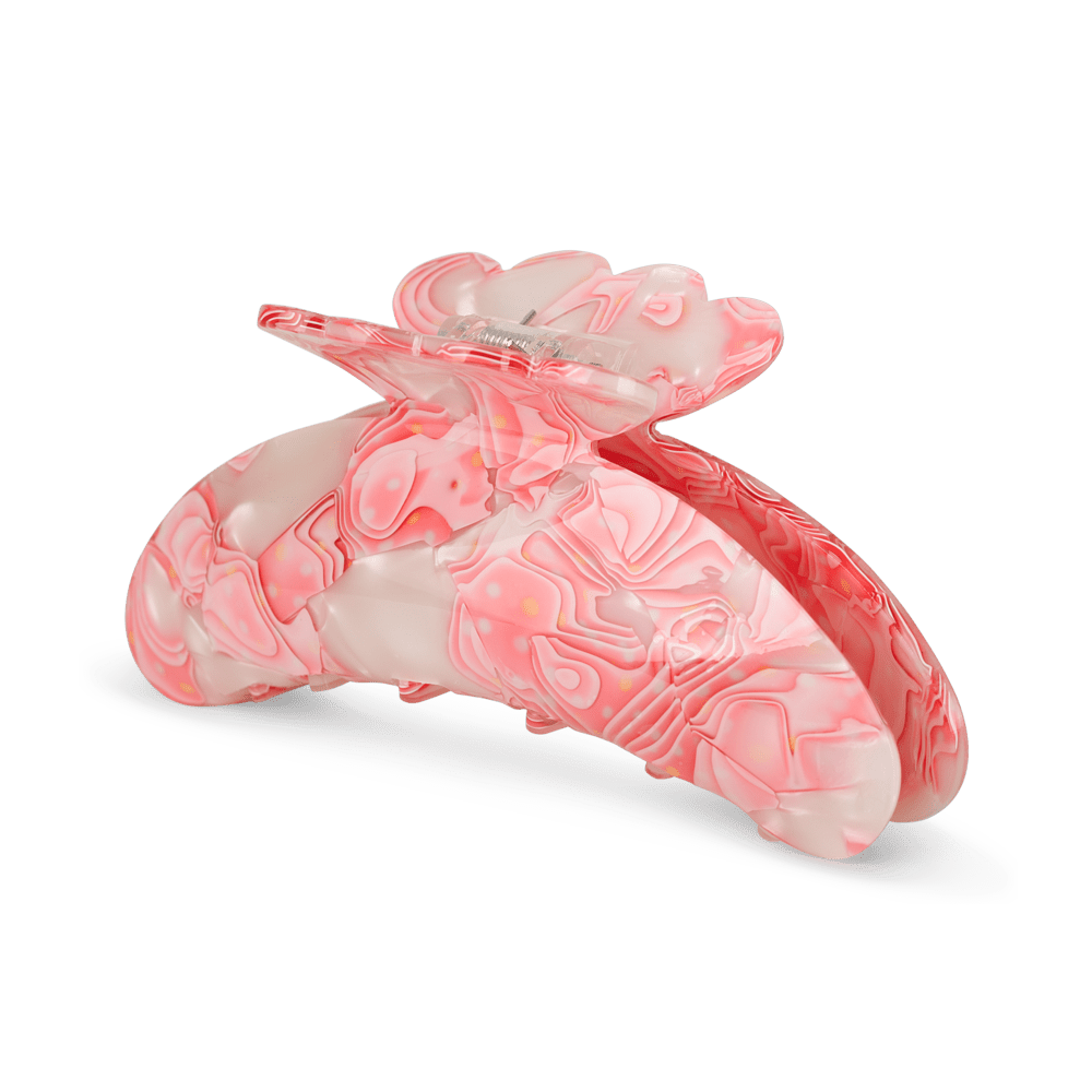 Helle Wavy Big hårklemme med pink og hvidt bølgemønster – perfekt til tykkere hår og kreative frisurer.
