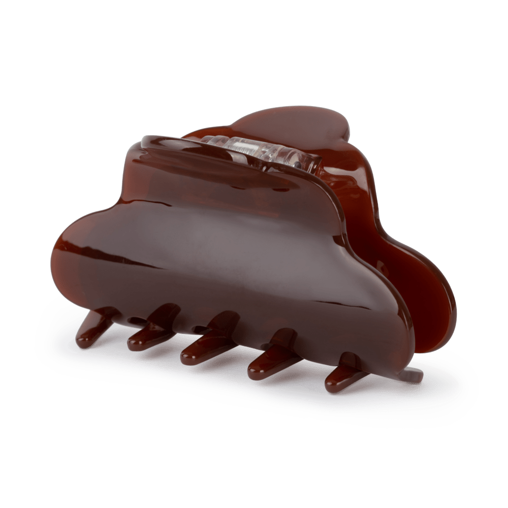 Lene Lunar Big hårklemme i brunrød – stor hårklemme med kurvet design og stærkt greb, perfekt til langt og kraftigt hår.