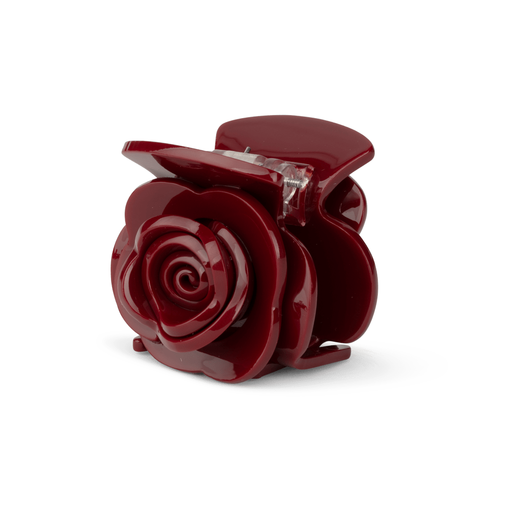 Rosie Mini fra SUI AVA – charmerende mini hårklemme med et romantisk rosedesign, perfekt til at tilføje et feminint og elegant touch til dine frisurer.