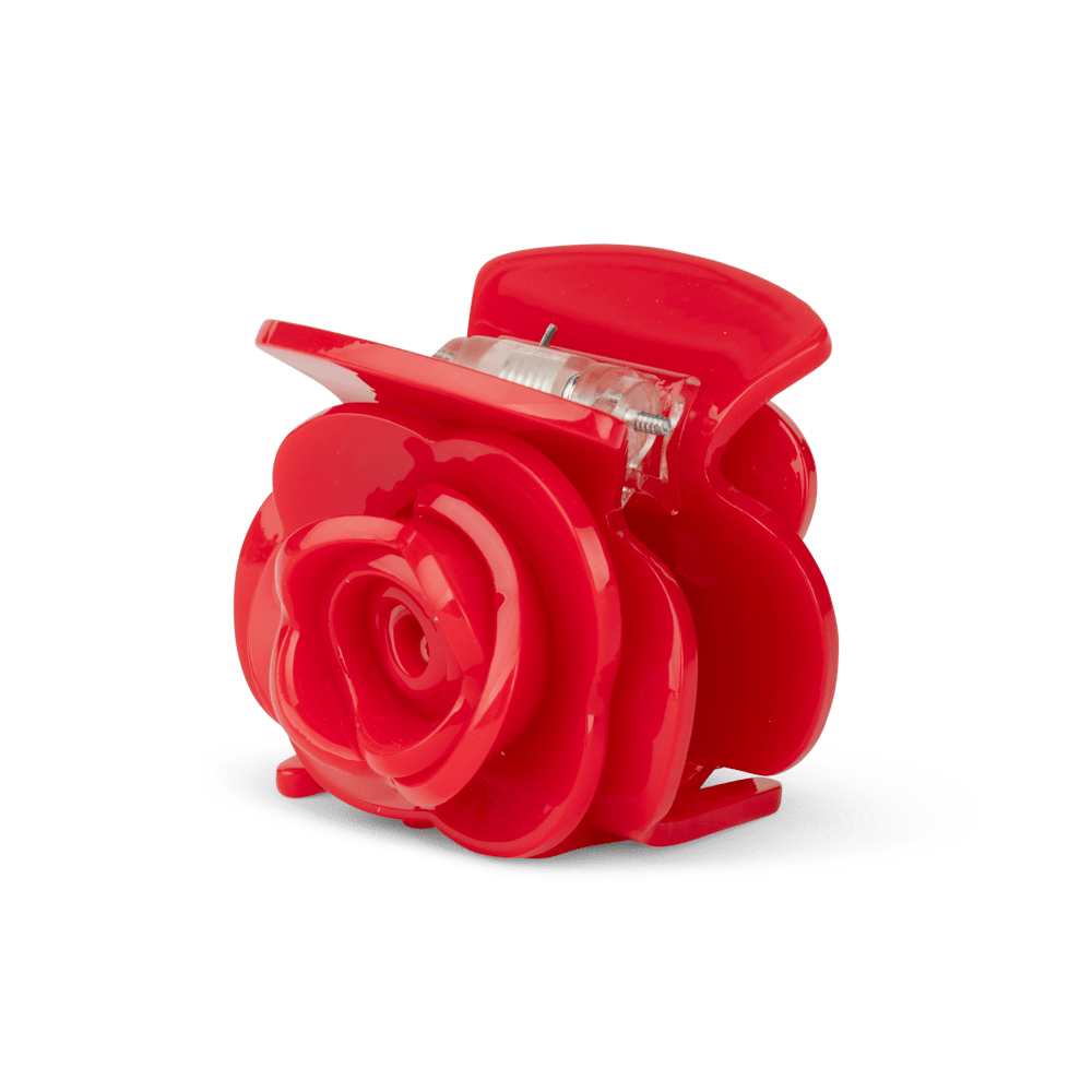 Rosie Mini fra SUI AVA – delikat mini hårklemme med et smukt rosedesign, ideel til at skabe feminine og sofistikerede frisurer.