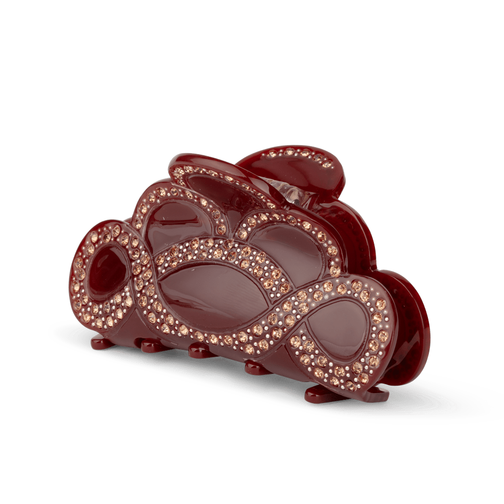 Liv Circular Middle fra SUI AVA – mellemstor hårklemme med et unikt cirkulært design, ideel til at tilføje et moderne og stilfuldt touch til dine frisurer.