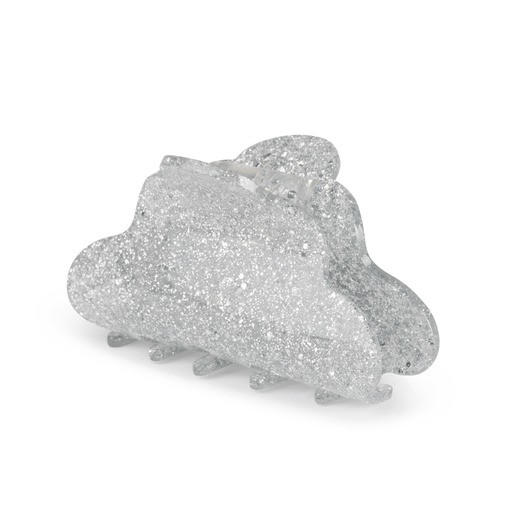 Lene Glitter Big fra SUI AVA – elegant stor hårklemme med skinnende glimmerdetaljer, ideel til at tilføje et glamourøst og festligt præg til dine frisurer.