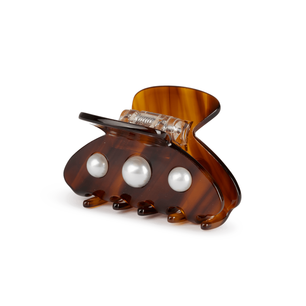 Ida Classic Pearly Mini fra SUI AVA – delikat mini hårklemme med perledesign, perfekt til at tilføje et klassisk og feminint præg til dine frisurer.