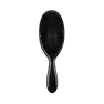 SUI AVA Brush – hårbørste med et stilrent design, skabt til blid hårpleje og effektiv styling, perfekt til både hverdag og særlige lejligheder.