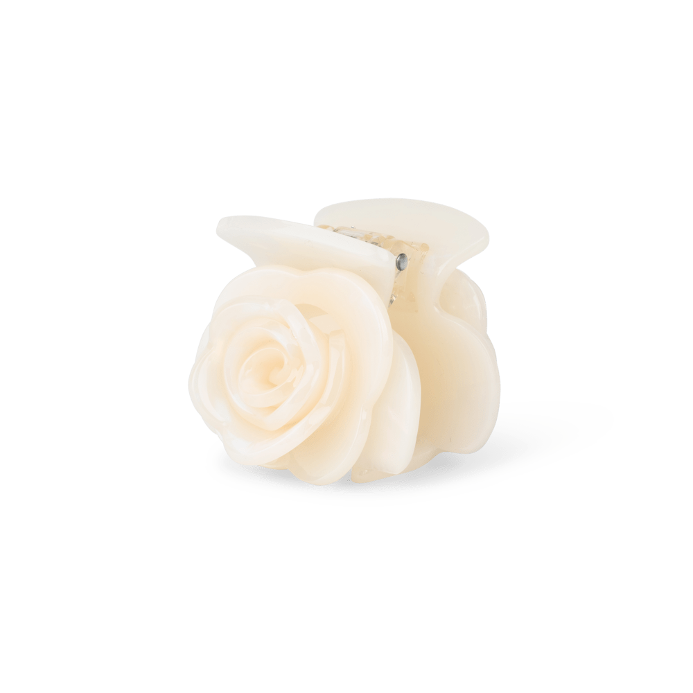 Rosie Mini hårklemme i hvid – lille hårklemme formet som en rose, perfekt til at holde små sektioner af håret på plads.