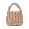Beige Sally Braided Bag med chunky flettestruktur og blødt håndtag.
