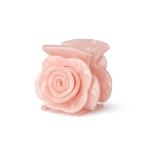 Rosie Mini hårklemme i pink – lille hårklemme formet som en rose, ideel til fint hår eller små sektioner. Elegant og dekorativt design.