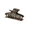 Stor hårklemme med army-camouflage mønster i grønne, brune og sorte nuancer